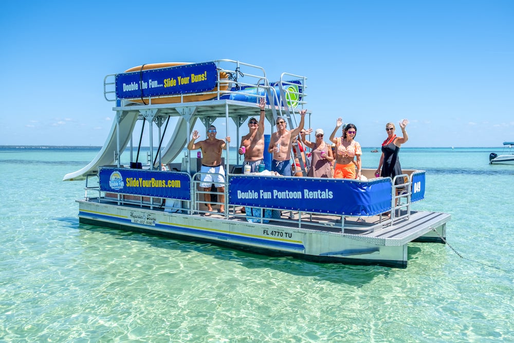 friends and family at Crab Island on double decker pontoon boat in destin, florida