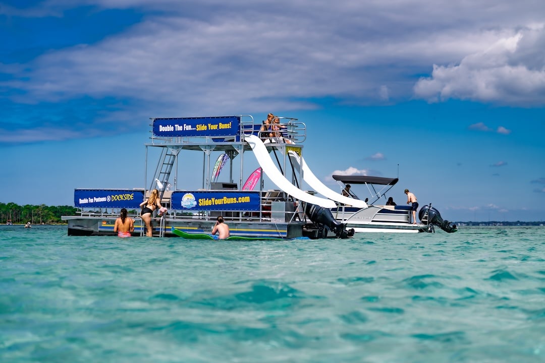 family group using a double decker pontoon at crab island