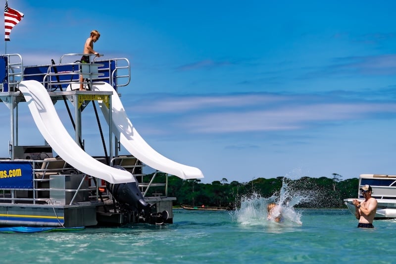 kids sliding and splashing at crab island destin