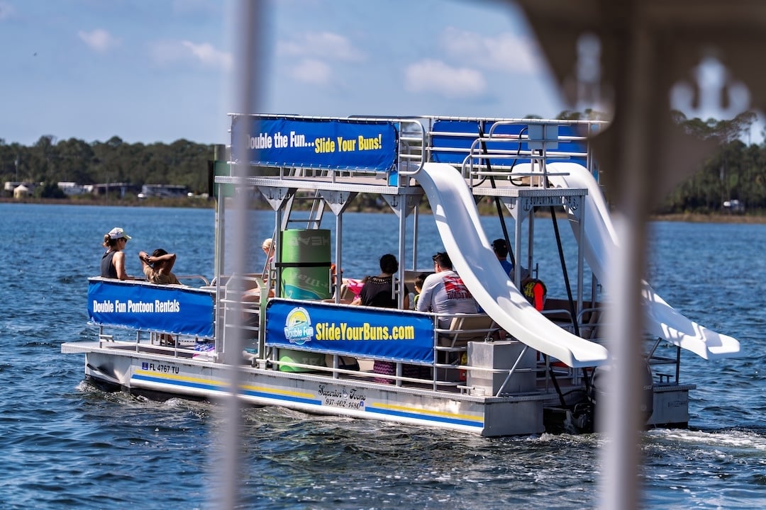 large group cruising on a double decker pontoon in panama city beach