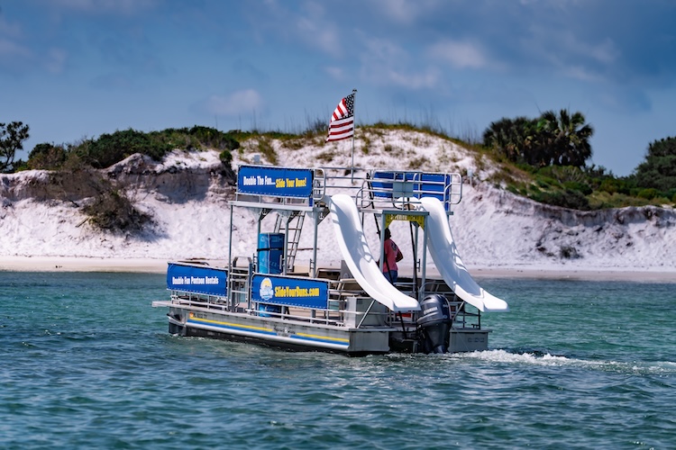 double decker pontoon boat parked at shell island in panama city beach florida